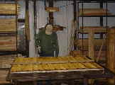 making a Waney Lap fence panels in our fencing manufacturing workshop